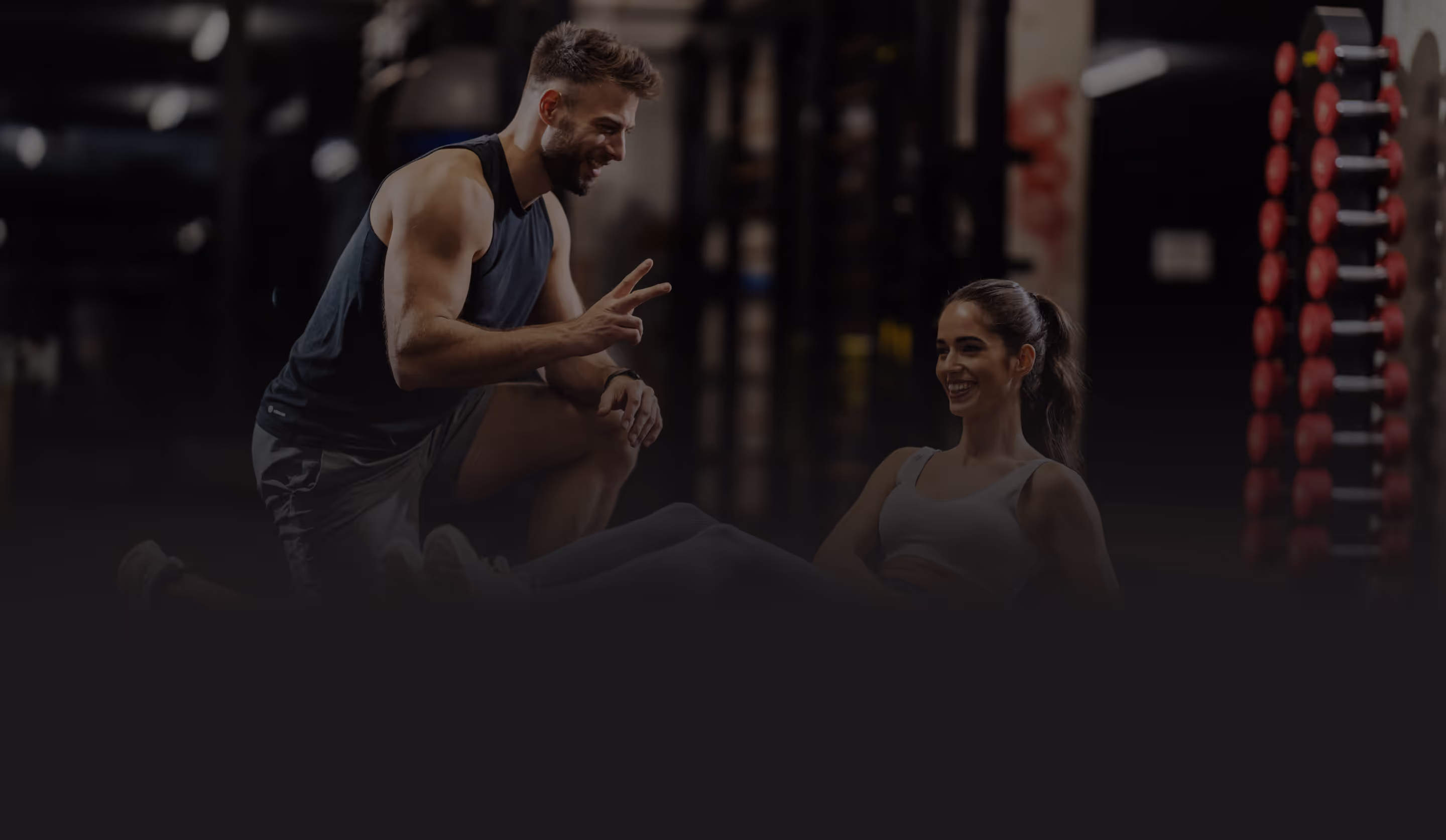 Personal trainer counting an exercise
